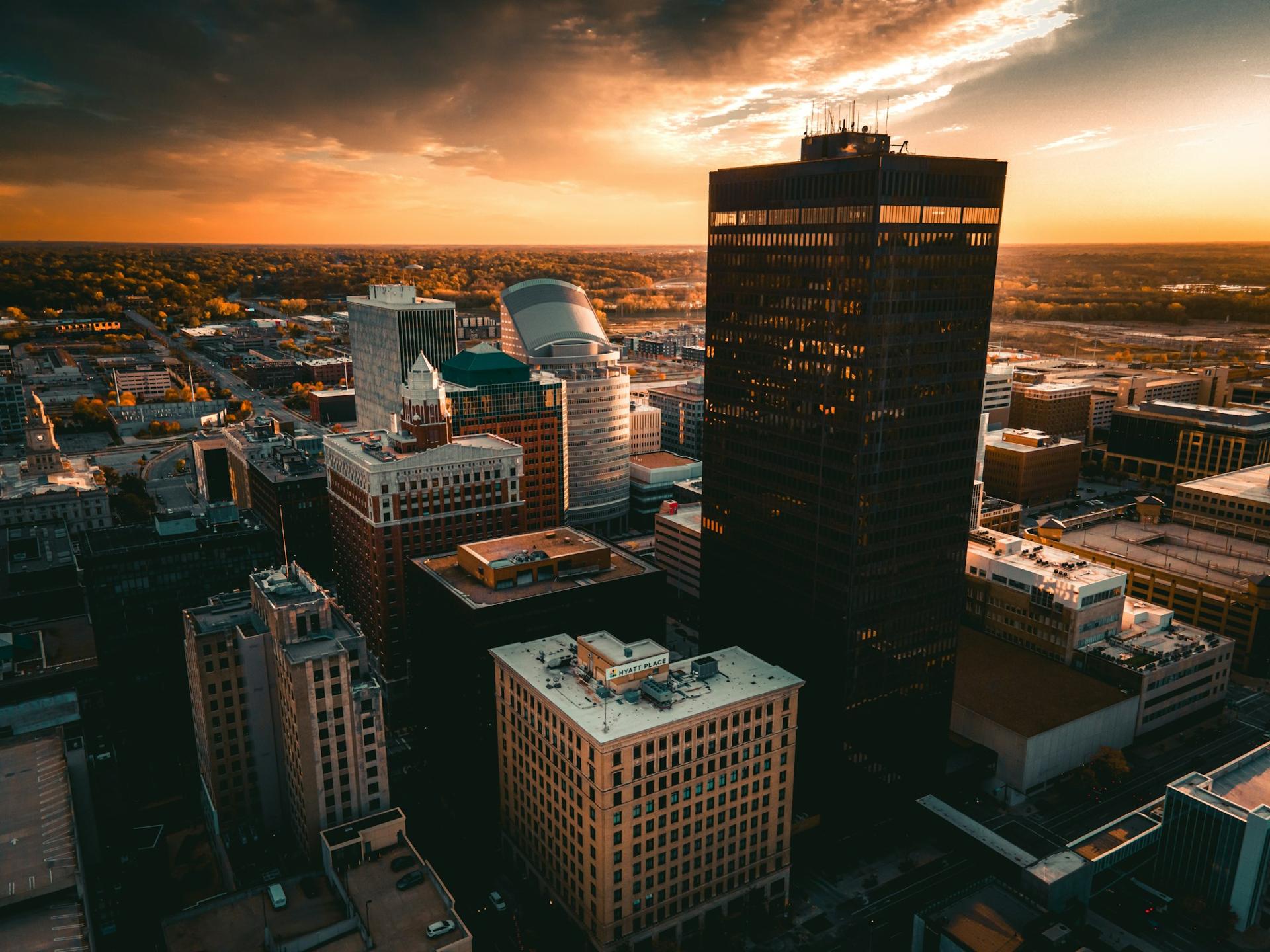 A city skyline from above at sunset